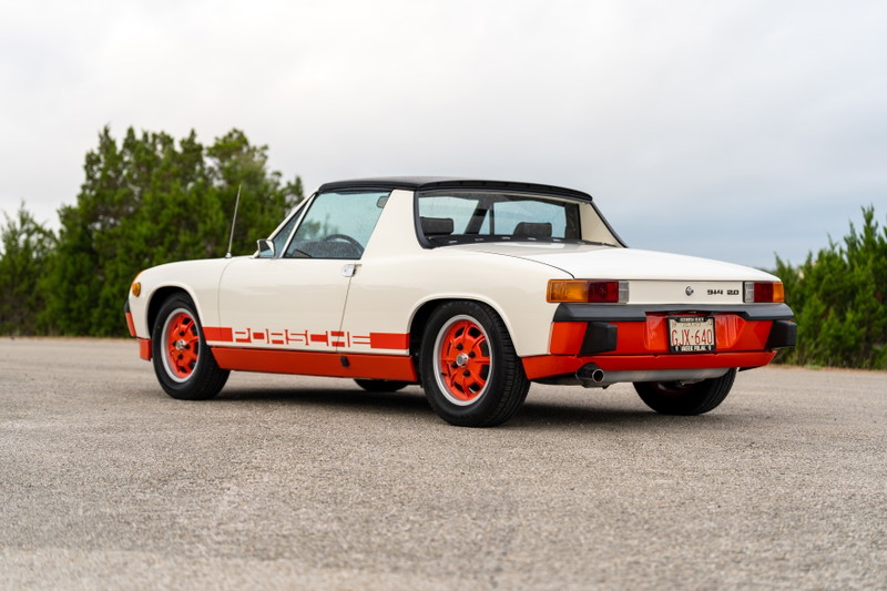 Cream and orange 1974 Porsche 914 Can-Am LE with matching orange rims and side livery.